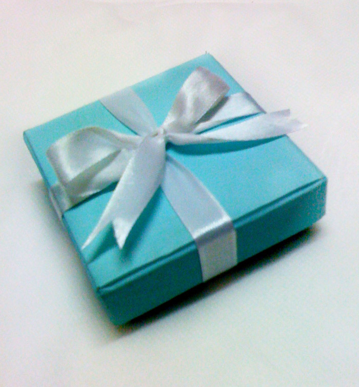 She says Surprise Wedding Favor in Tiffany Box